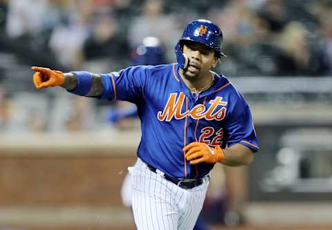 NEW YORK, NEW YORK – MAY 20: Dominic Smith #22 of the New York Mets celebrates his RBI single in the eighth inning against the Washington Nationals at Citi Field on May 20, 2019 in the Flushing neighborhood of the Queens borough of New York City. (Photo by Elsa/Getty Images)