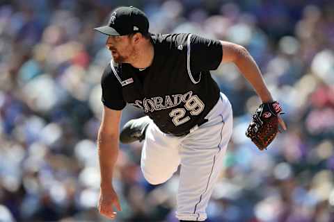 DENVER, COLORADO – JUNE 12: Brian Shaw #29 of the Colorado Rockies throws in the seventh inning against the Chicago Cubs at Coors Field on June 12, 2019 in Denver, Colorado. (Photo by Matthew Stockman/Getty Images)