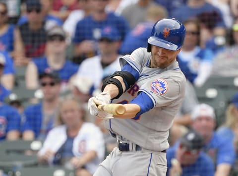 CHICAGO, ILLINOIS – JUNE 23: Jacob deGrom #48 of the New York Mets hits a RBI single in the fifth inning against the Chicago Cubs at Wrigley Field on June 23, 2019 in Chicago, Illinois. (Photo by Quinn Harris/Getty Images)