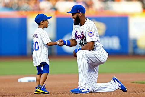 NEW YORK, NY – JULY 27: Amed Rosario #1 of the New York Mets shakes hands with a young fan prior to taking on the Pittsburgh Pirates at Citi Field on July 27, 2019 in the Flushing neighborhood of the Queens borough of New York City. (Photo by Adam Hunger/Getty Images)