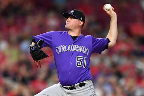 CINCINNATI, OH – JULY 27: Jake McGee #51 of the Colorado Rockies pitches in the eighth inning against the Cincinnati Reds at Great American Ball Park on July 27, 2019 in Cincinnati, Ohio. Cincinnati defeated Colorado 3-1. (Photo by Jamie Sabau/Getty Images)