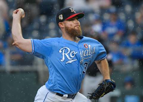 KANSAS CITY, MO – JULY 04: Ian Kennedy #31 of the Kansas City Royals throws against the Cleveland Indians in the rain during the ninth inning at Kauffman Stadium on July 4, 2019 in Kansas City, Missouri. (Photo by Reed Hoffmann/Getty Images)