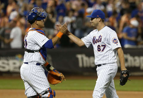 NEW YORK, NEW YORK – AUGUST 10: Seth Lugo #67 and Wilson Ramos #40 of the New York Mets celebrate after defeating the Washington Nationals at Citi Field on August 10, 2019 in New York City. (Photo by Jim McIsaac/Getty Images)