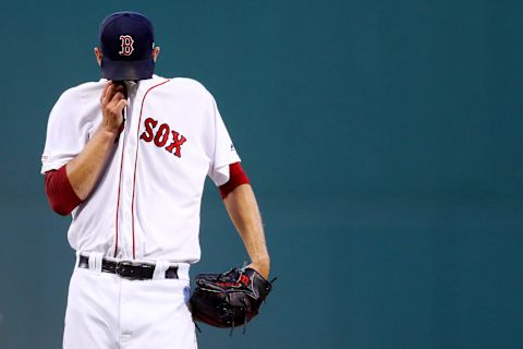 BOSTON, MASSACHUSETTS – AUGUST 21: Starting pitcher Rick Porcello #22 of the Boston Red Sox prepares to throw against the Philadelphia Phillies during the first inning at Fenway Park on August 21, 2019 in Boston, Massachusetts. (Photo by Maddie Meyer/Getty Images)