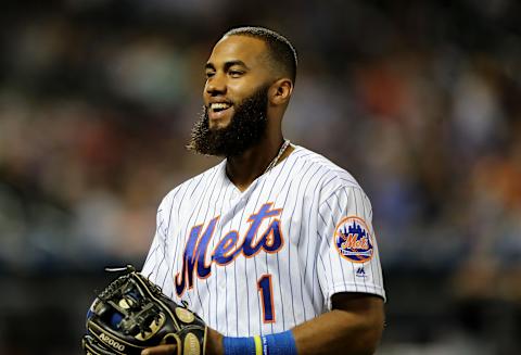 NEW YORK, NEW YORK – AUGUST 21: Amed Rosario #1 of the New York Mets walks into the dugout after the fourth inning against the Cleveland Indians at Citi Field on August 21, 2019 in the Flushing neighborhood of the Queens borough of New York City. (Photo by Elsa/Getty Images)