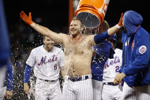 NEW YORK, NEW YORK – SEPTEMBER 06: Pete Alonso #20 of the New York Mets celebrates with teammates after defeating the Philadelphia Phillies 5-4 during a game at Citi Field on September 06, 2019 in New York City. (Photo by Michael Owens/Getty Images)