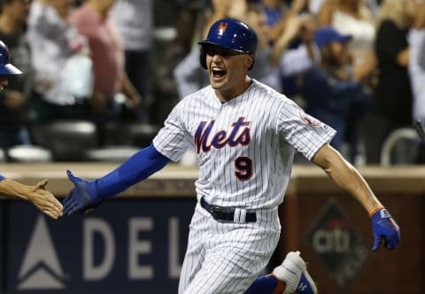 NEW YORK, NEW YORK – SEPTEMBER 14: Brandon Nimmo #9 of the New York Mets celebrates after scoring a run in the eighth inning against the Los Angeles Dodgers at Citi Field on September 14, 2019 in New York City. (Photo by Jim McIsaac/Getty Images)