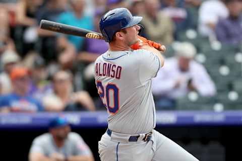 DENVER, COLORADO – SEPTEMBER 18: Pete Alonso #20 of the New York Mets hits a solo home run in the sixth inning against the Colorado Rockies at Coors Field on September 18, 2019 in Denver, Colorado. (Photo by Matthew Stockman/Getty Images)