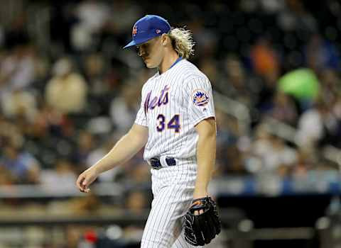 NEW YORK, NEW YORK – SEPTEMBER 24: Noah Syndergaard #34 of the New York Mets walks off the field after the fifth inning against the Miami Marlins at Citi Field on September 24, 2019 in the Flushing neighborhood of the Queens borough of New York City. (Photo by Elsa/Getty Images)