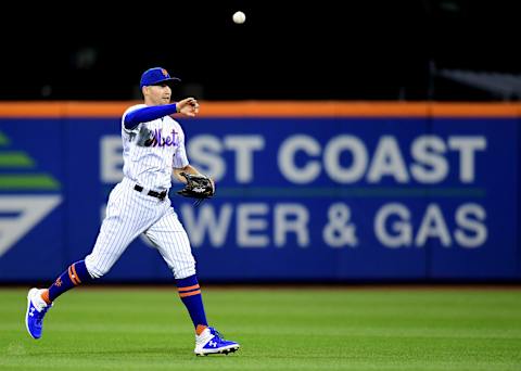 NEW YORK, NEW YORK – SEPTEMBER 24: Brandon Nimmo #9 of the New York Mets throws the ball to infield during the fifth inning of their game against the Miami Marlins at Citi Field on September 24, 2019 in the Flushing neighborhood of the Queens borough of New York City. (Photo by Emilee Chinn/Getty Images)