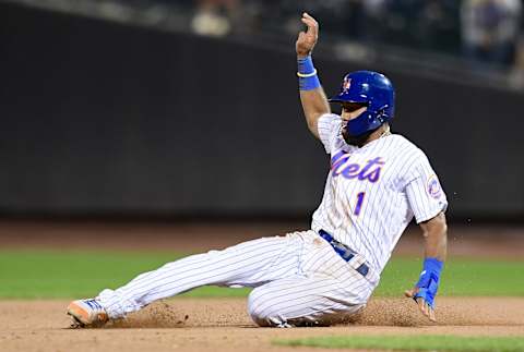 NEW YORK, NEW YORK – SEPTEMBER 24: Amed Rosario #1 of the New York Mets slides into second base in the ninth inning of their game against the Miami Marlins at Citi Field on September 24, 2019 in the Flushing neighborhood of the Queens borough of New York City. (Photo by Emilee Chinn/Getty Images)