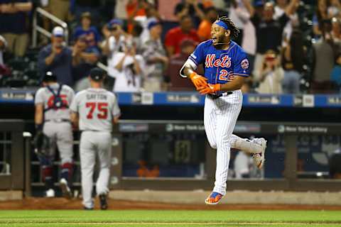 NEW YORK, NEW YORK – SEPTEMBER 29: Dominic Smith #22 of the New York Mets celebrates after hitting a walk-off 3-run home run in the bottom of the eleventh inning against the Atlanta Braves at Citi Field on September 29, 2019 in New York City. (Photo by Mike Stobe/Getty Images)