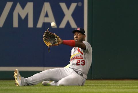 WASHINGTON, DC – OCTOBER 14: Marcell Ozuna #23 of the St. Louis Cardinals attempts to make the catch on an RBI double by Anthony Rendon #6 of the Washington Nationals in the third inning of game three of the National League Championship Series at Nationals Park on October 14, 2019 in Washington, DC. (Photo by Patrick Smith/Getty Images)