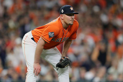 HOUSTON, TEXAS – OCTOBER 30: Will Harris #36 of the Houston Astros reacts after allowing a two-run home run to Howie Kendrick (not pictured) of the Washington Nationals during the seventh inning in Game Seven of the 2019 World Series at Minute Maid Park on October 30, 2019 in Houston, Texas. (Photo by Elsa/Getty Images)