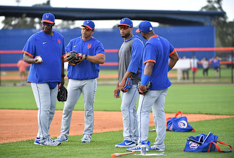 PORT ST. LUCIE, FLORIDA – FEBRUARY 20: Chili Davis #54, Luis Rojas #19, Robinson Cano #24 and Amed Rosario #1 of the New York Mets during the team workout at Clover Park on February 20, 2020 in Port St. Lucie, Florida. (Photo by Mark Brown/Getty Images)