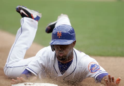 New York Mets Jose Reyes stealing third base during game 1 of doubleheader against the Florida Marlins, played at Shea Stadium in Flushing, N.Y. Mets defeated the Marlins 17 – 3 on July 8, 2006. (Photo by Bryan Yablonsky/Getty Images)