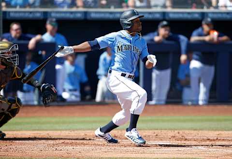 PEORIA, ARIZONA – MARCH 05: Mallex Smith #0 of the Seattle Mariners hits a ground ball during the first inning of a Cactus League spring training baseball game against the San Diego Padres at Peoria Stadium on March 05, 2020 in Peoria, Arizona. (Photo by Ralph Freso/Getty Images)