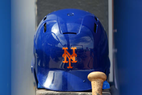 PORT ST. LUCIE, FL – MARCH 08: A New York Mets batting helmet in the dugout before a spring training baseball game against the Houston Astros at Clover Park on March 8, 2020 in Port St. Lucie, Florida. The Mets defeated the Astros 3-1. (Photo by Rich Schultz/Getty Images)