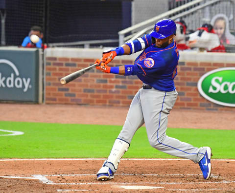 ATLANTA, GA – JULY 31: Robinson Cano #24 of the New York Mets hits a solo home run in the fifth inning against the Atlanta Braves at SunTrust Field on June 31, 2020 in Atlanta, Georgia. (Photo by Scott Cunningham/Getty Images)