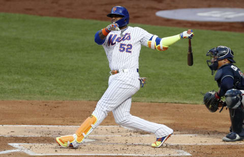 NEW YORK, NEW YORK – JULY 26: Yoenis Cespedes #52 of the New York Mets in action against the Atlanta Braves at Citi Field on July 26, 2020 in New York City. The 2020 season had been postponed since March due to the COVID-19 pandemic. The Braves defeated the Mets 14-1. (Photo by Jim McIsaac/Getty Images)