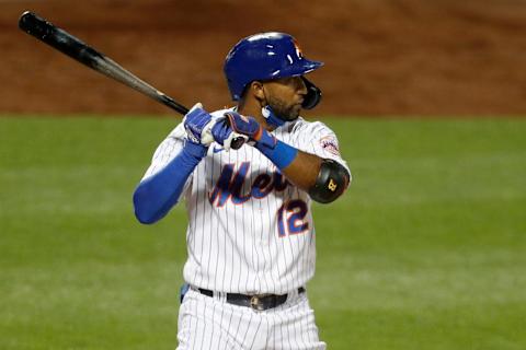 NEW YORK, NEW YORK – JULY 26: Eduardo Nunez #12 of the New York Mets in action against the Atlanta Braves at Citi Field on July 26, 2020 in New York City. The 2020 season had been postponed since March due to the COVID-19 pandemic. The Braves defeated the Mets 14-1. (Photo by Jim McIsaac/Getty Images)