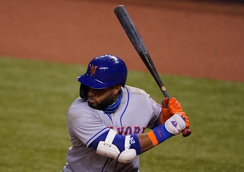 MIAMI, FLORIDA – AUGUST 19: Robinson Cano #24 of the New York Mets bats during the game against the Miami Marlins at Marlins Park on August 19, 2020 in Miami, Florida. (Photo by Mark Brown/Getty Images)