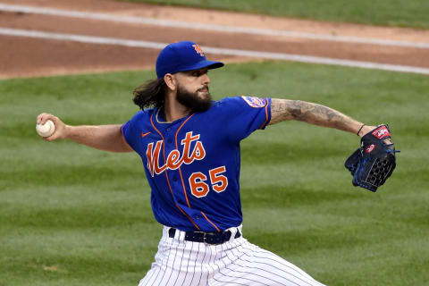 NEW YORK, NEW YORK – AUGUST 12: Robert Gsellman #65 of the New York Mets delivers the pitch against the Washington Nationals at Citi Field on August 12, 2020 in New York City. (Photo by Steven Ryan/Getty Images)