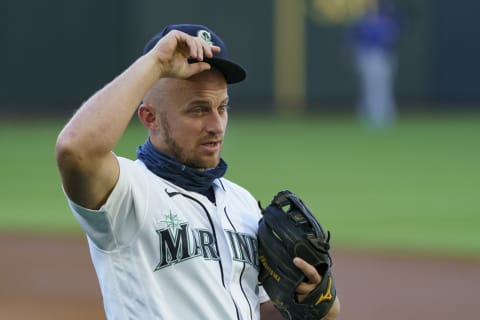 SEATTLE, WA – AUGUST 22: Kyle Seager #15 of the Seattle Mariners adjusts his cap on the field before a game against the Texas Rangers at T-Mobile Park on August, 22, 2020 in Seattle, Washington. The Mariners won 10-1. (Photo by Stephen Brashear/Getty Images)