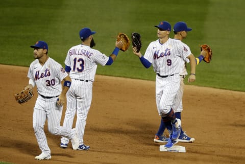 NEW YORK, NEW YORK – SEPTEMBER 05: Brandon Nimmo #9 and Luis Guillorme #13 of the New York Mets celebrate after defeating the Philadelphia Phillies at Citi Field on September 05, 2020 in New York City. The Mets defeated the Phillies 5-1. (Photo by Jim McIsaac/Getty Images)