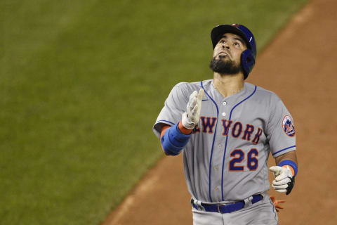 WASHINGTON, DC – SEPTEMBER 24: Robinson Chirinos #26 of the New York Mets celebrates after hitting a two-run home run in the fifth inning against the Washington Nationals at Nationals Park on September 24, 2020 in Washington, DC. (Photo by Patrick McDermott/Getty Images)