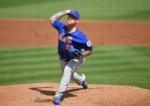 JUPITER, FLORIDA – MARCH 01: Sean Reid-Foley #61 of the New York Mets delivers a pitch in the second inning against the Miami Marlins in a spring training game at Roger Dean Chevrolet Stadium on March 01, 2021 in Jupiter, Florida. (Photo by Mark Brown/Getty Images)