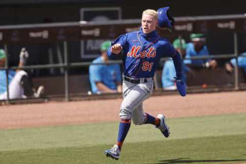 JUPITER, FLORIDA – MARCH 17: Pete Crow-Armstrong #91 of the New York Mets scores a run against the Miami Marlins during the seventh inning of a Grapefruit League spring training game at Roger Dean Stadium on March 17, 2021 in Jupiter, Florida. (Photo by Michael Reaves/Getty Images)