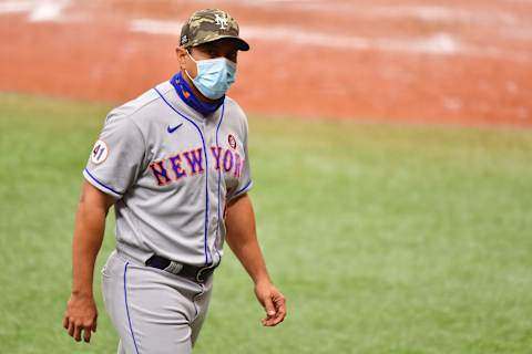 ST PETERSBURG, FLORIDA – MAY 15: Manager Luis Rojas #19 of the New York Mets looks on in the eighth inning against the Tampa Bay Rays at Tropicana Field on May 15, 2021 in St Petersburg, Florida. (Photo by Julio Aguilar/Getty Images)