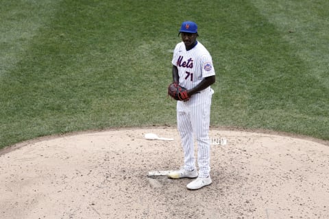 NEW YORK, NY – JULY 29: Akeem Bostick #71 of the New York Mets pitches during the ninth inning against the Atlanta Braves at Citi Field on July 29, 2021 in New York City. The Mets won 6-3. (Photo by Adam Hunger/Getty Images)