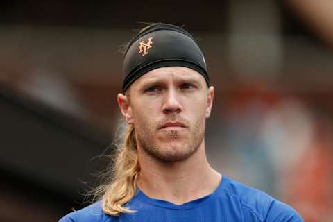 SAN FRANCISCO, CALIFORNIA – AUGUST 18: Noah Syndergaard #34 of the New York Mets looks on from the bench during the game against the San Francisco Giants at Oracle Park on August 18, 2021 in San Francisco, California. (Photo by Lachlan Cunningham/Getty Images)