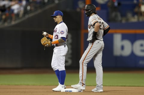 NEW YORK, NEW YORK – AUGUST 25: Kris Bryant 23 of the San Francisco Giants stands at second base during the seventh inning with Javier Baez #23 of the New York Mets at Citi Field on August 25, 2021 in New York City. (Photo by Jim McIsaac/Getty Images)