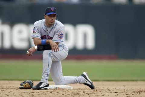 SAN FRANCISCO – AUGUST 22: Shortstop Rey Ordonez #10 of the New York Mets kneels on second base during the MLB game against the San Francisco Giants on August 22, 2002 at Pacific Bell Park in San Francisco, California. The Giants won 3-1. (Photo by Jed Jacobsohn/Getty Images)