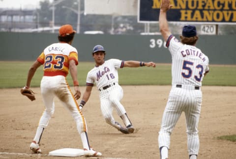 NEW YORK – CIRCA 1979: Lee Mazzilli #16 of the New York Mets slides into third base as Enos Cabell #23 of the Houston Astros looks on during an Major League Baseball game circa 1979 at Shea Stadium in the Queens borough of New York City. Mazzilli played for the Mets from 1976-82. (Photo by Focus on Sport/Getty Images)