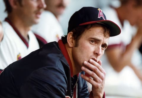 ANAHEIM, CA – 1973: Pitcher Nolan Ryan #30 of the California Angels sits on the bench during an MLB game circa 1973 at Angel Stadium in Anaheim, California. (Photo by Robert Riger/Getty Images)