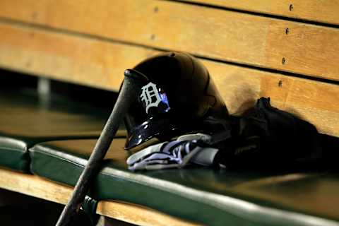 DETROIT, MI – OCTOBER 17: A Detroit Tigers batting helmet sits in the dugout during Game Five of the American League Championship Series against the Boston Red Sox at Comerica Park on October 17, 2013 in Detroit, Michigan. (Photo by Jamie Squire/Getty Images)