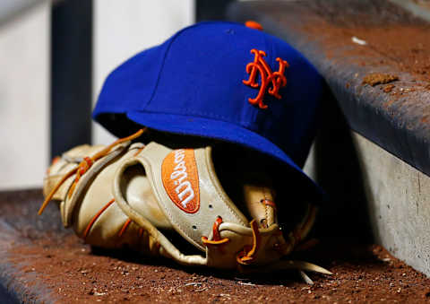 NEW YORK, NY – AUGUST 30: The cap and Wilson glove of David Wright #5 of the New York Mets sits on a dugout step during a game against the Philadelphia Phillies on August 30, 2014 at Citi Field in the Flushing neighborhood of the Queens borough of New York City. (Photo by Rich Schultz/Getty Images)