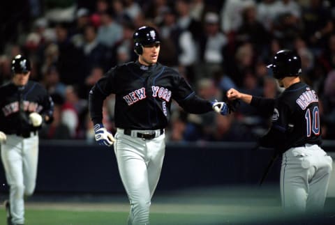 19 Oct 1999: John Olerud #5 of the New York Mets celebrates as he runs the base during the National League Championship Series game six against the Atlanta Braves at Turner Field in Atlanta, Georgia. The Braves defeated the Mets 10-9. Mandatory Credit: Jed Jacobsohn /Allsport