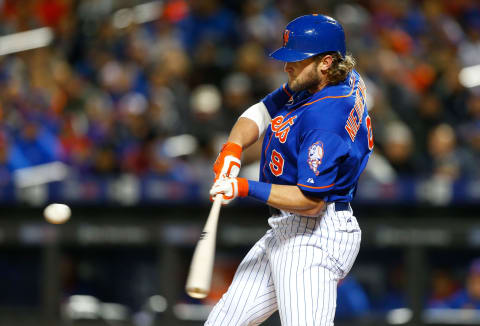 NEW YORK, NY – OCTOBER 03: (NEW YORK DAILIES OUT) Kirk Nieuwenhuis #9 of the New York Mets in action against the Washington Nationals at Citi Field on October 3, 2015 in the Flushing neighborhood of the Queens borough of New York City. The Nationals defeated the Mets 2-0. (Photo by Jim McIsaac/Getty Images)