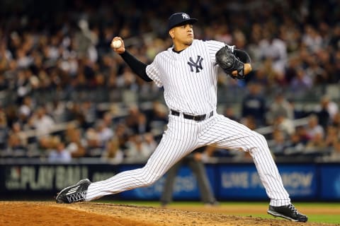 NEW YORK, NY – OCTOBER 06: Dellin Betances #68 of the New York Yankees throws a pitch to relieve Justin Wilson #41 in the seventh inning against the Houston Astros during the American League Wild Card Game at Yankee Stadium on October 6, 2015 in New York City. (Photo by Elsa/Getty Images)