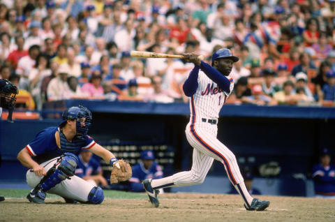 FLUSHING, NY – 1984: Mookie Wilson #1 of the New York Mets swings at the pitch during a 1984 season game against the Chicago Cubs at Shea Stadium in Flushing, New York. (Photo by Rich Pilling/MLB Photos via Getty Images)