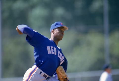 1992: Dwight Gooden of the New York Mets winds back to pitch during a1992 season game. Dwight Gooden played for the New York Mets from 1984-1997. (Photo by: Bernstein Associates/Getty Images)