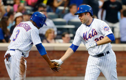 NEW YORK, NY – JUNE 16: Neil Walker #20 of the New York Mets celebrates his third-inning, two-run home run against the Pittsburgh Pirates with teammate Curtis Granderson #3 at Citi Field on June 16, 2016 in the Flushing neighborhood of the Queens borough of New York City. (Photo by Jim McIsaac/Getty Images)