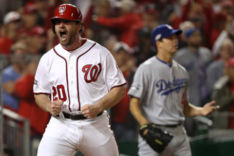 WASHINGTON, DC – OCTOBER 13: Daniel Murphy #20 of the Washington Nationals celebrates after scoring off of an RBI single hit by Danny Espinosa #8 of the Washington Nationals (not pictured) in the second inning against the Los Angeles Dodgers during game five of the National League Division Series at Nationals Park on October 13, 2016 in Washington, DC. (Photo by Patrick Smith/Getty Images)