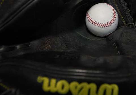 SAN FRANCISCO, CA – MAY 15: A detailed view of a Major League Baseball sitting in a Wilson’s catchers glove prior to the start of the game between the Los Angeles Dodgers and San Francisco Giants at AT&T Park on May 15, 2017 in San Francisco, California. (Photo by Thearon W. Henderson/Getty Images)