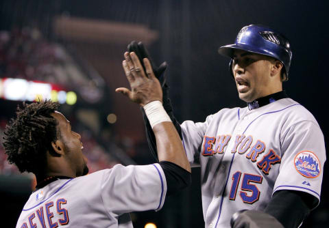 ST LOUIS – OCTOBER 15: Carlos Beltran #15 with Jose Reyes of the New York Mets celebrates after hitting a solo home run in the seventh inning against the St. Louis Cardinals during game four of the NLCS at Busch Stadium on October 15, 2006 in St. Louis, Missouri. (Photo by Elsa/Getty Images)